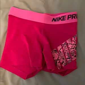 pink nike pros snake print